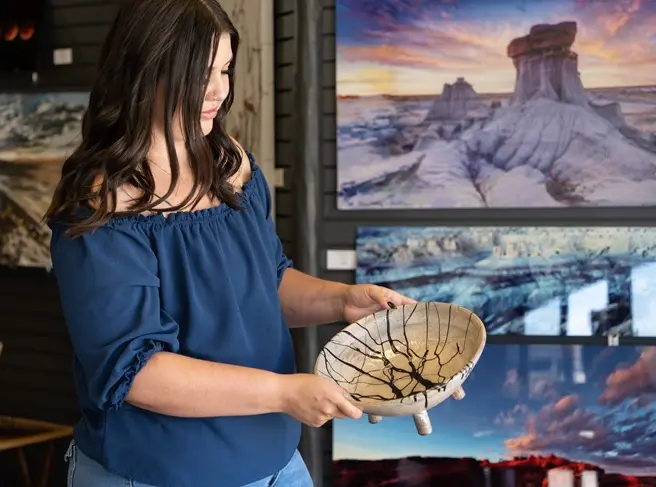 Woman shopping at art gallery